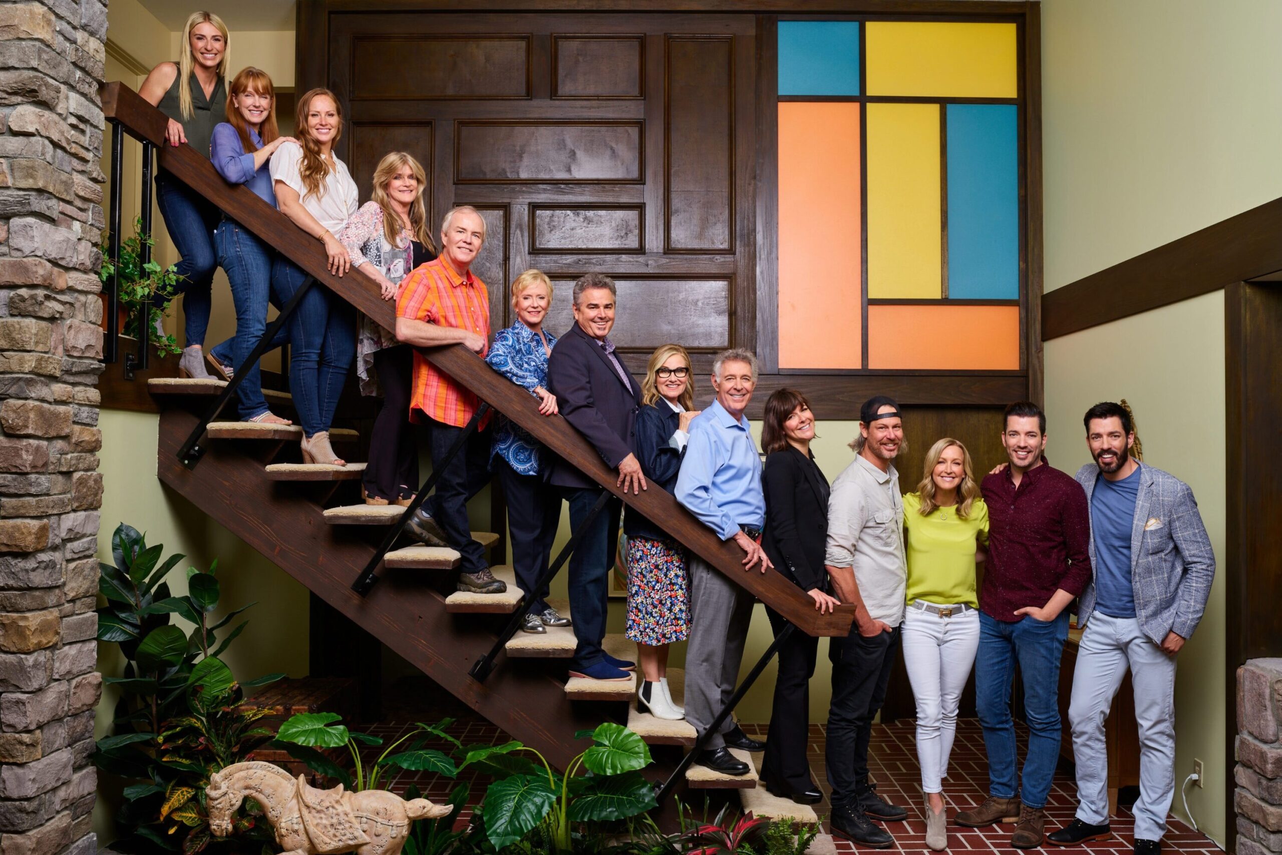 A VERY BRADY RENOVATION, from left: Jasmine Roth, Karen E. Laine, Mina Starsiak, Susan Olsen, Mike Lookinland, Eve Plumb, Christopher Knight, Maureen McCormick, Barry Williams, Leanne Ford, Steve Ford, Lara Spencer, Jonathan Scott, Drew Scott, (Season 1, premiered Sept. 9, 2019)